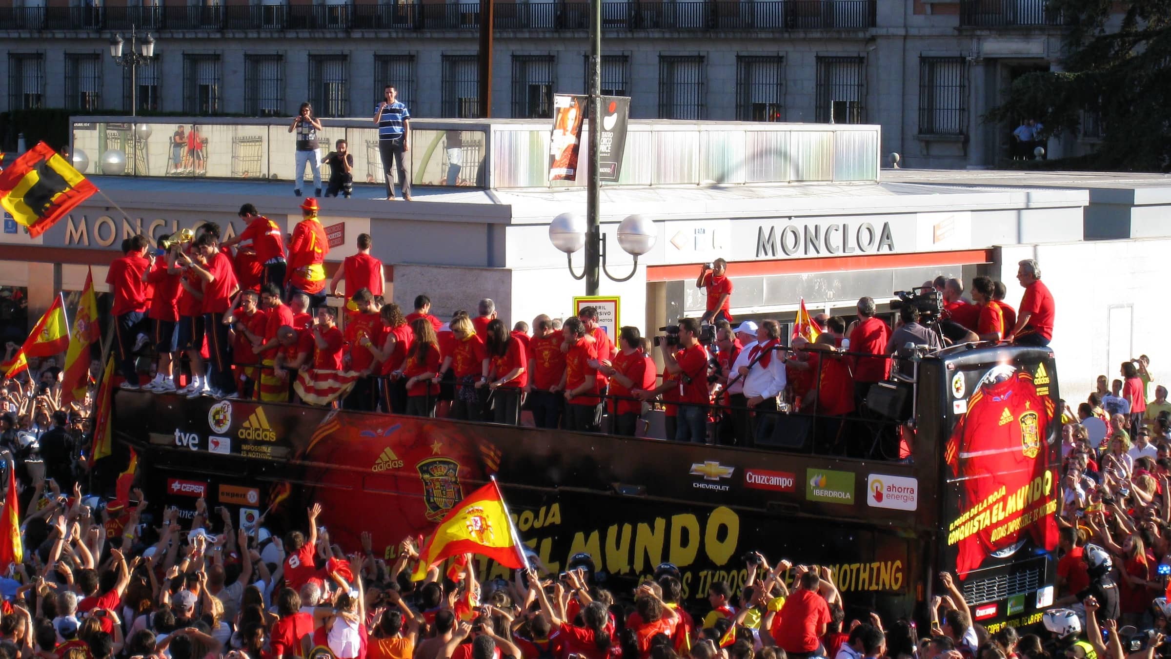 Spain players celebrate a World Cup title on an open-top bus in Madrid