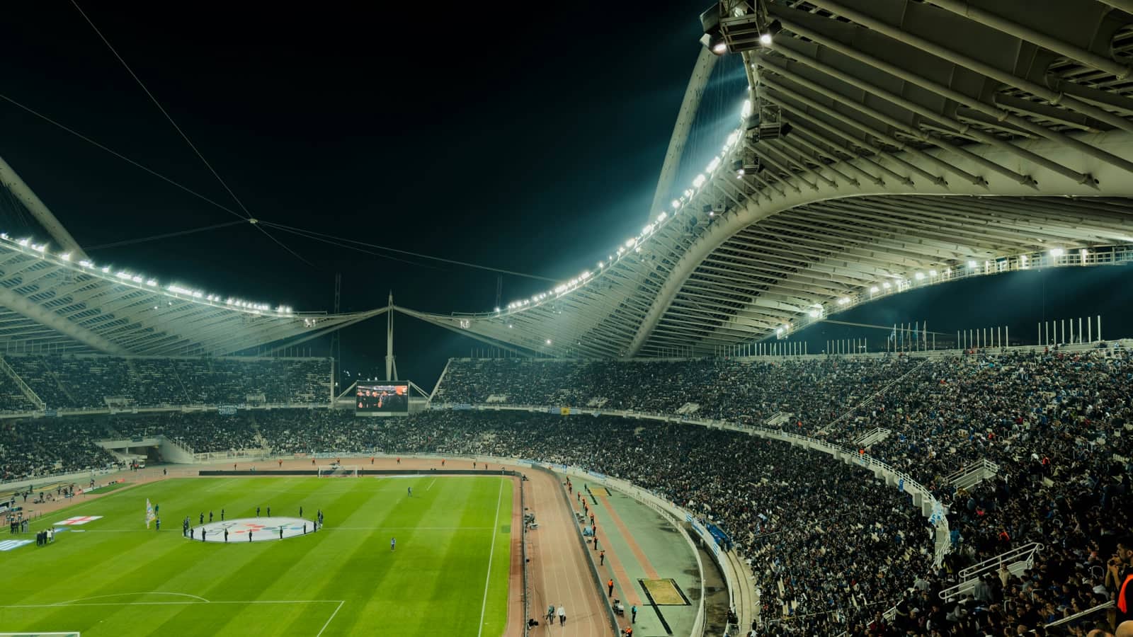 Crowded football stadium at night ahead of World Cup 2026 predictions